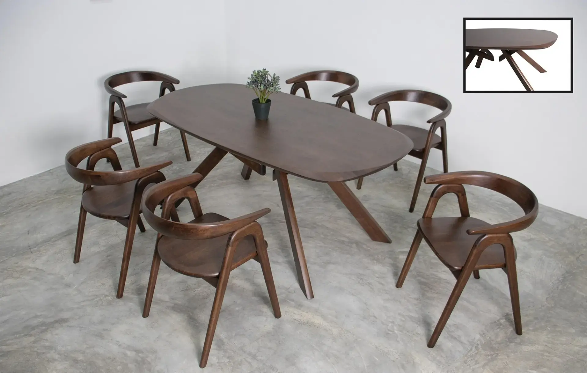 Oval walnut dining set with curved armchairs